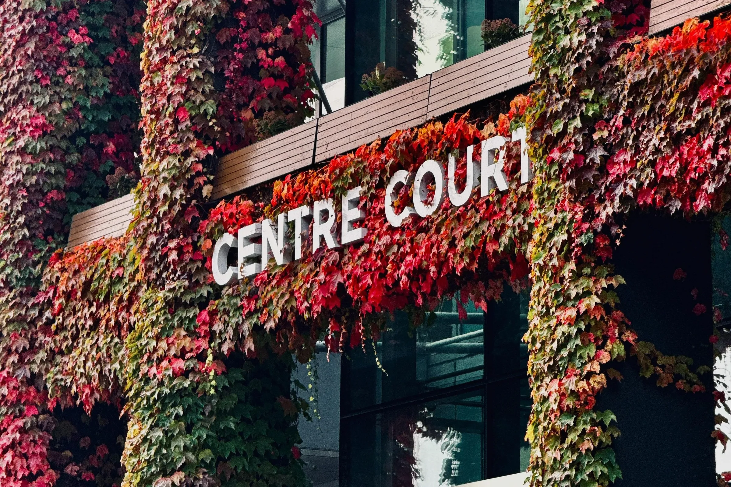 The ivy-clad wall of Centre Court at Wimbledon, with its Centre Court lettering.