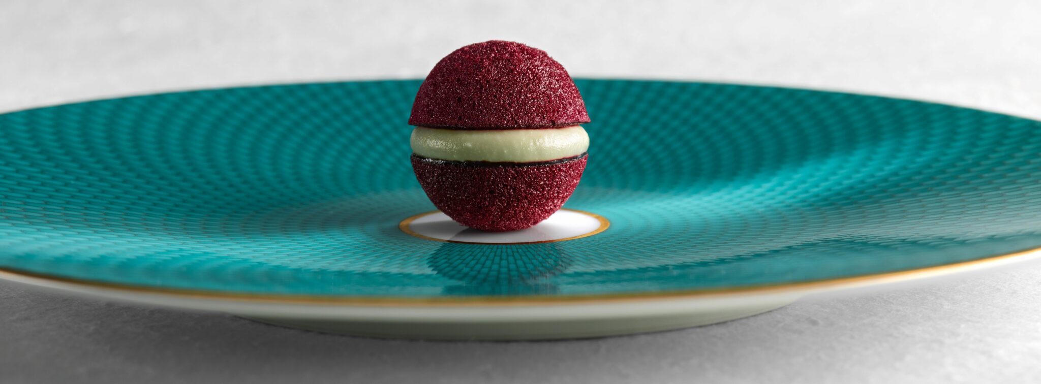 Image of a red velvet dessert presented on a plate