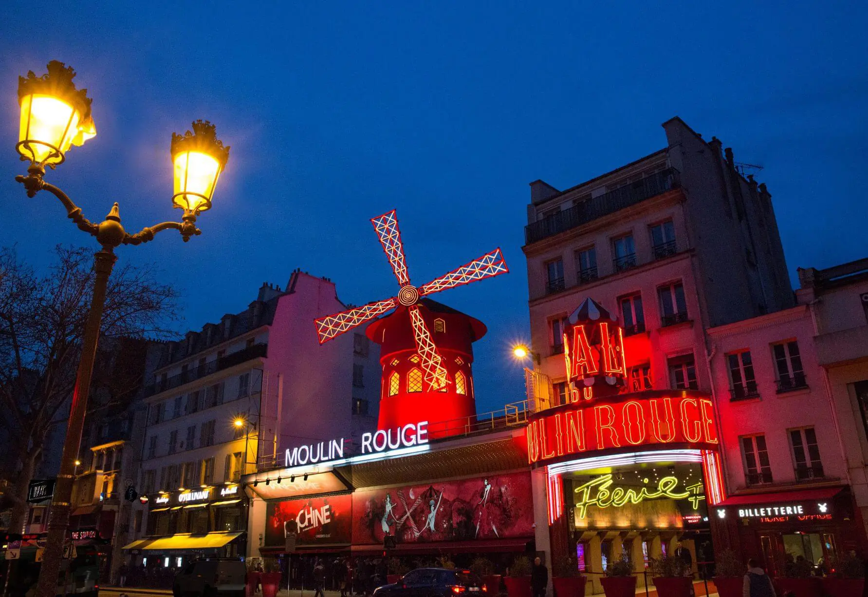 Moulin Rouge lit up outside during the evening