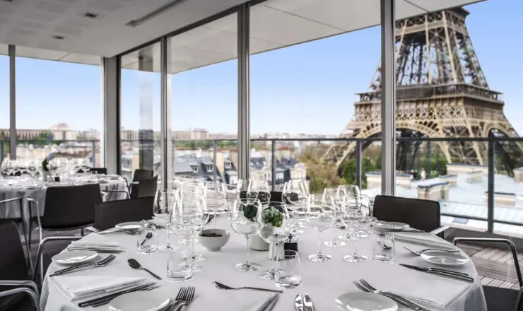Image of hotel restaurant with the dining area overlooking the eiffel tower