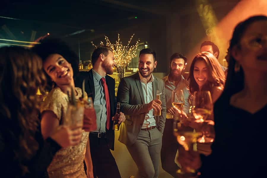 Image of guests enjoying their cocktails with a party atmosphere