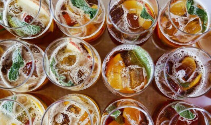 Image of glasses of Pimm's layed out in a row